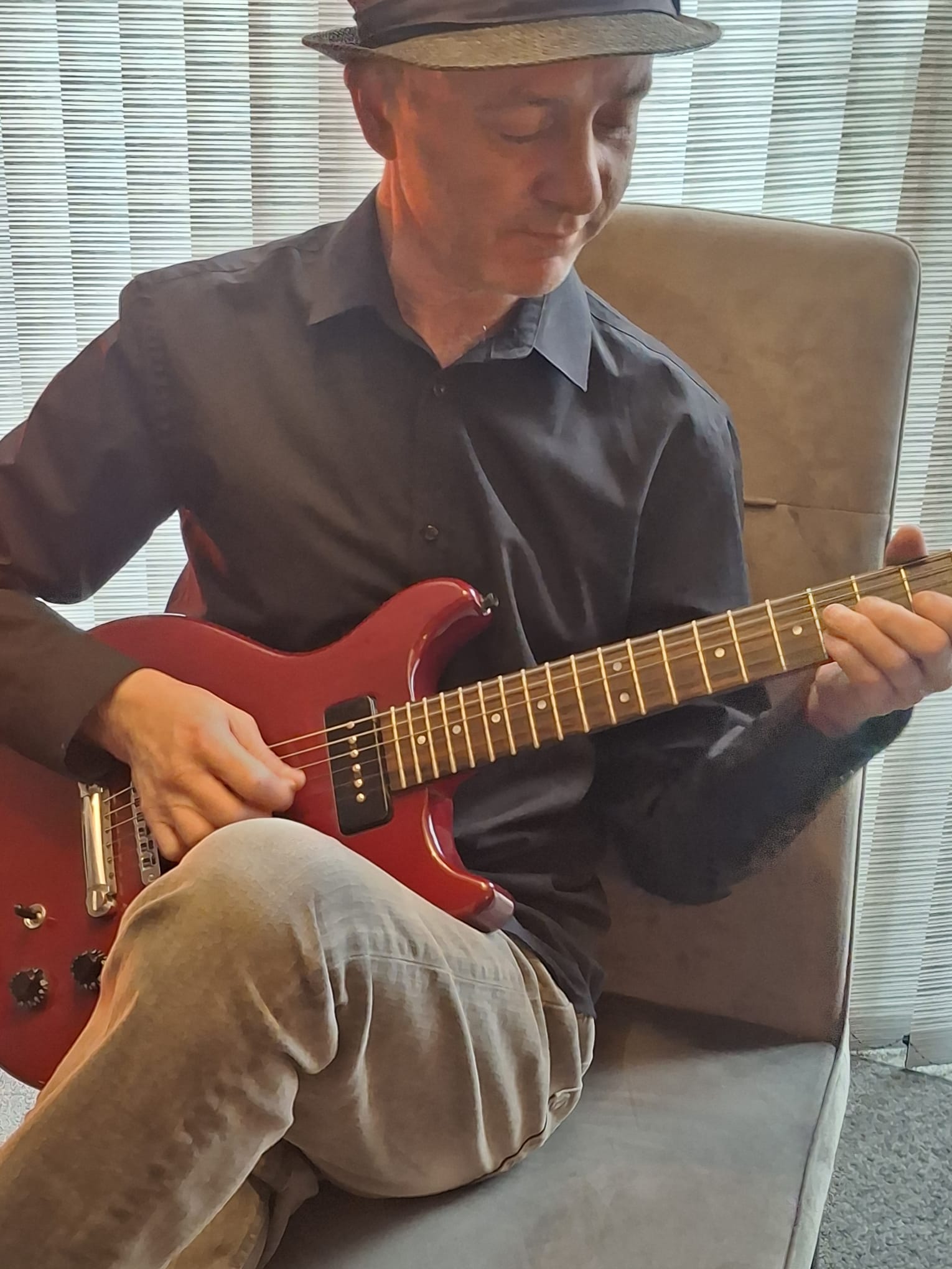 Curt teaching guitar at his private teaching space